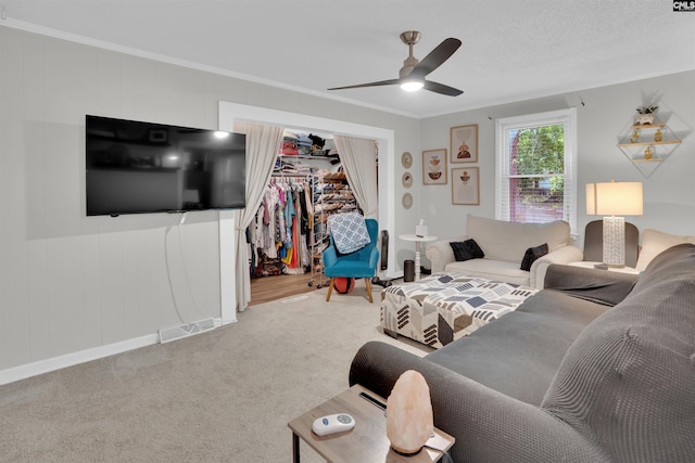 1715 Lacy St, Columbia, SC 29169 - living area with crown molding, carpet floors, and ceiling fan