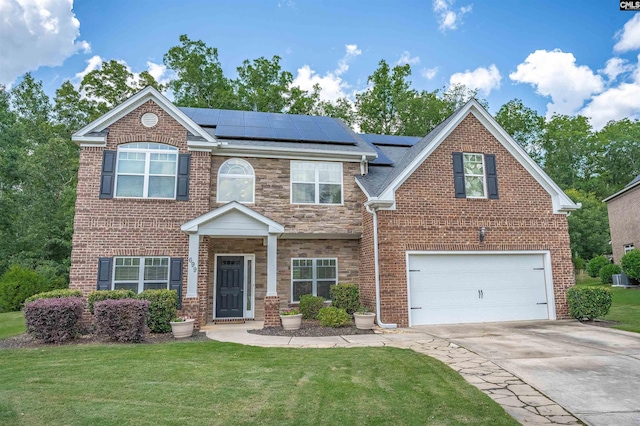 699 Village Market Dr, Chapin, SC 29036 - view of front of property featuring concrete driveway, an attached garage, a front lawn, and brick siding