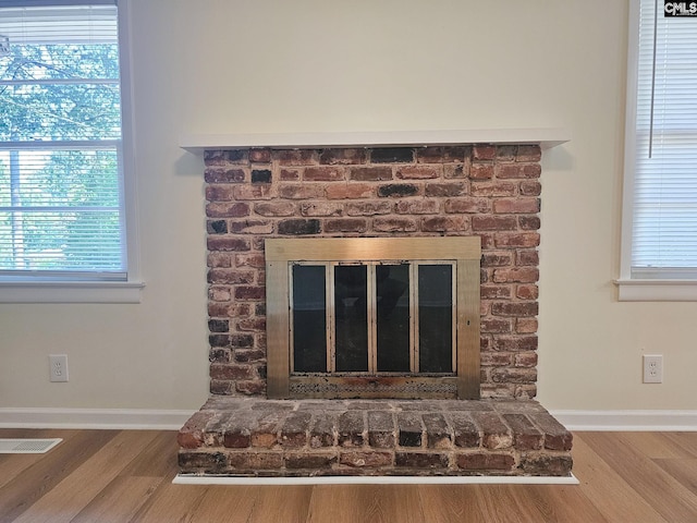 1712 Omarest Dr, Columbia, SC 29210 - detailed view of wood finished floors and a fireplace
