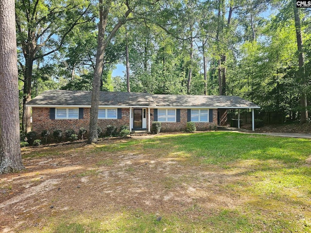 1712 Omarest Dr, Columbia, SC 29210 - single story home featuring driveway, brick siding, a front yard, and a carport