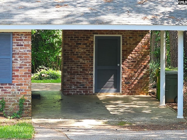 1712 Omarest Dr, Columbia, SC 29210 - property entrance with roof with shingles and brick siding