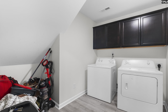 465 Vanburen Ct, Gaston, SC 29053 - laundry area with independent washer and dryer, cabinet space, and light wood-style floors