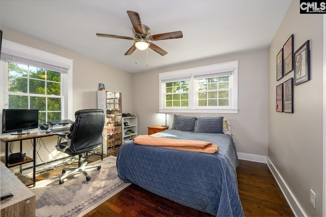 3139 Travis Ct, Columbia, SC 29204 - bedroom with wood finished floors, an office area, and ceiling fan