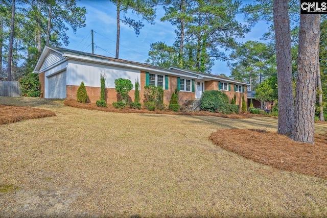 3139 Travis Ct, Columbia, SC 29204 - single story home featuring brick siding, an attached garage, and a front yard