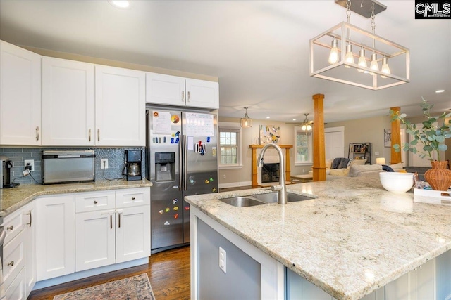 3139 Travis Ct, Columbia, SC 29204 - kitchen with stainless steel refrigerator with ice dispenser, white cabinetry, a ceiling fan, and recessed lighting