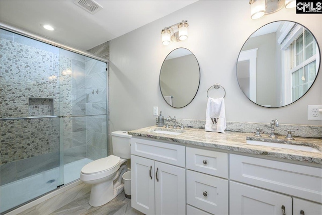 3139 Travis Ct, Columbia, SC 29204 - bathroom with double vanity and a stall shower