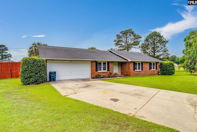 40 Stonehedge Ct, Sumter, SC 29154 - view of front of home with an attached garage, driveway, and brick siding