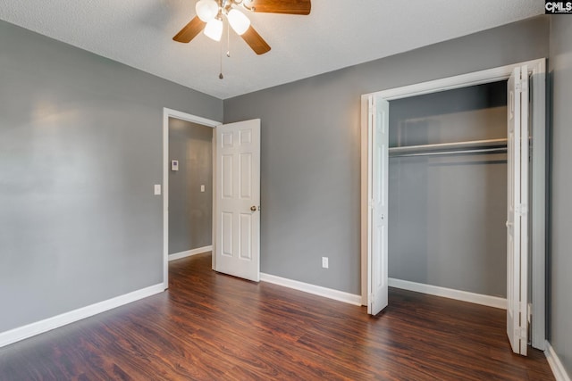 40 Stonehedge Ct, Sumter, SC 29154 - unfurnished bedroom with dark wood-style flooring, a closet, and a ceiling fan