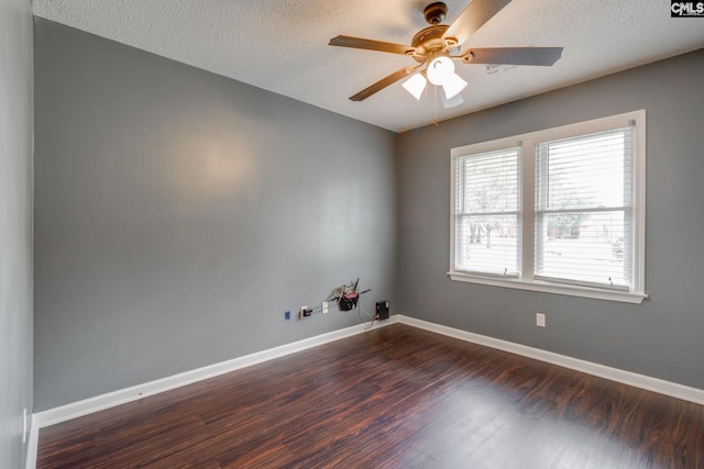40 Stonehedge Ct, Sumter, SC 29154 - empty room with dark wood finished floors, ceiling fan, and a textured ceiling