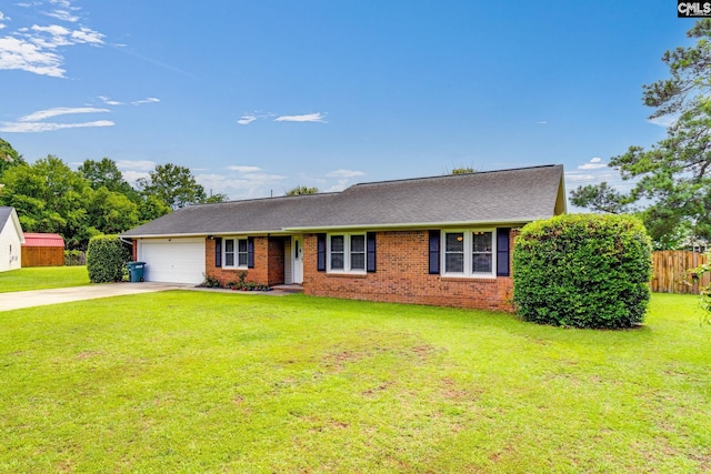 40 Stonehedge Ct, Sumter, SC 29154 - view of front facade with an attached garage, driveway, brick siding, and a shingled roof