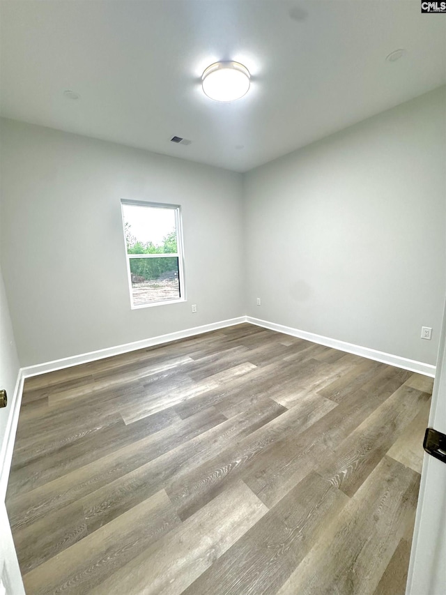 10 Lincolnshire Ct, Columbia, SC 29203 - empty room with dark wood-style flooring and baseboards
