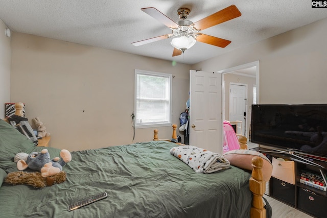 255 Sunnydale Dr, Columbia, SC 29223 - bedroom featuring a ceiling fan, wood finished floors, and a textured ceiling