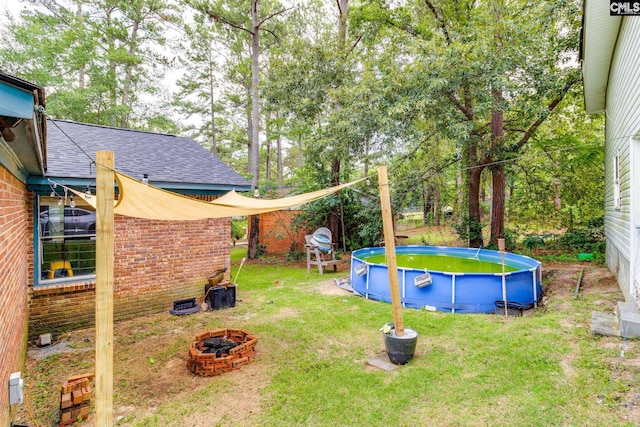 255 Sunnydale Dr, Columbia, SC 29223 - view of grassy yard with a fire pit and an outdoor pool
