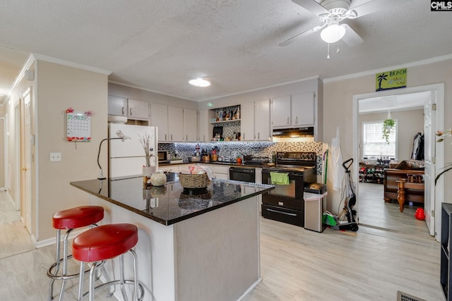 255 Sunnydale Dr, Columbia, SC 29223 - kitchen with black appliances, under cabinet range hood, ornamental molding, open shelves, and backsplash