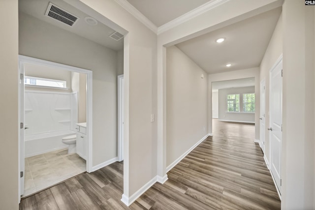 259 Backspin Dr, Elgin, SC 29045 - corridor with wood finished floors, ornamental molding, and recessed lighting