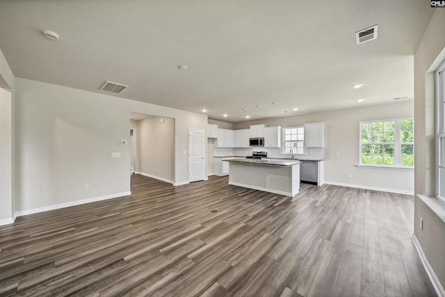 259 Backspin Dr, Elgin, SC 29045 - unfurnished living room featuring dark wood-type flooring and recessed lighting