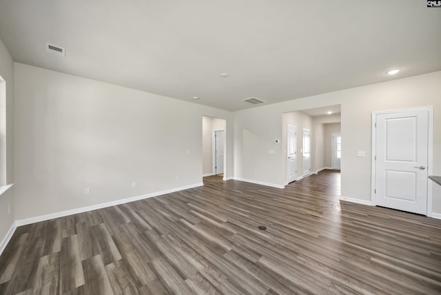259 Backspin Dr, Elgin, SC 29045 - unfurnished living room with dark wood-style floors and recessed lighting