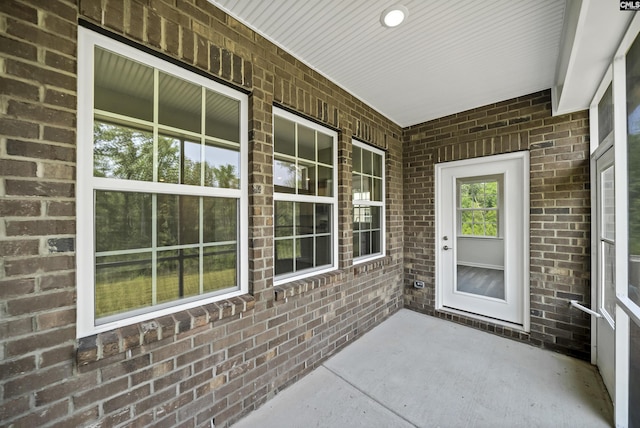 259 Backspin Dr, Elgin, SC 29045 - view of exterior entry with covered porch and brick siding