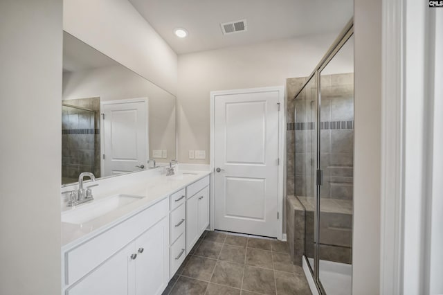 259 Backspin Dr, Elgin, SC 29045 - full bathroom with double vanity, a stall shower, and tile patterned flooring