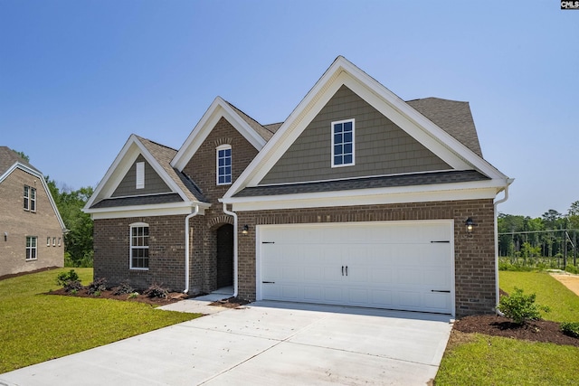 259 Backspin Dr, Elgin, SC 29045 - view of front facade with brick siding, concrete driveway, a front yard, and a garage