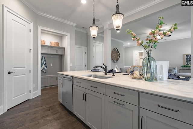 2340 Hadley Xing, Chapin, SC 29036 - kitchen with dishwasher, dark wood-style flooring, light stone counters, ornamental molding, and decorative light fixtures