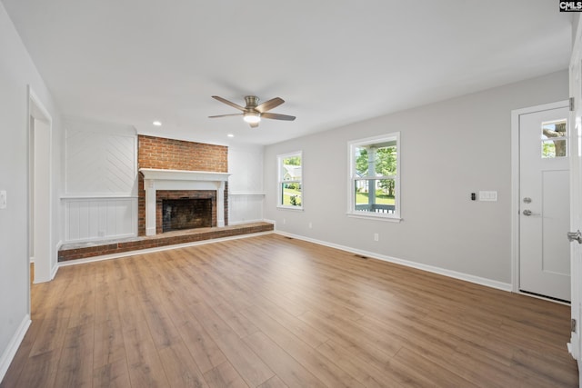 100 Coventry Ct, Lexington, SC 29072 - unfurnished living room with ceiling fan, a fireplace, wood finished floors, and recessed lighting