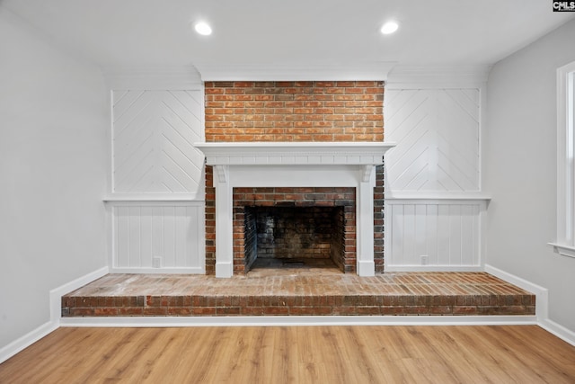 100 Coventry Ct, Lexington, SC 29072 - detailed view of a fireplace, wood finished floors, crown molding, and recessed lighting