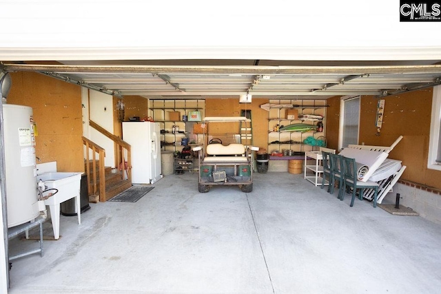 108 Warden Way, Irmo, SC 29063 - garage featuring gas water heater and a sink