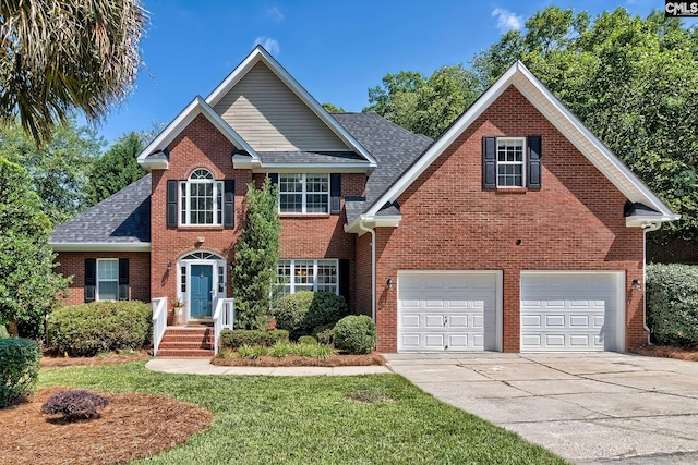 305 W Ashford Way, Irmo, SC 29063 - colonial inspired home featuring brick siding, concrete driveway, a shingled roof, and a front lawn