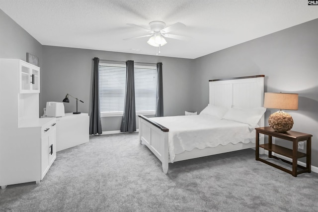 1040 Night Harbor Cir, Chapin, SC 29036 - bedroom with light colored carpet, a textured ceiling, and ceiling fan