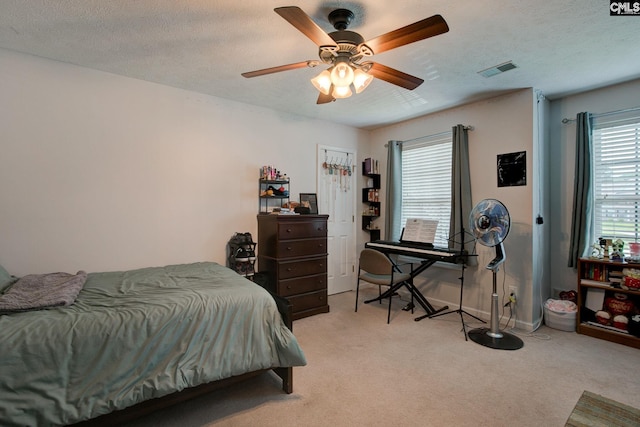7 Chickasaw Cir, Columbia, SC 29229 - bedroom with light carpet and a ceiling fan