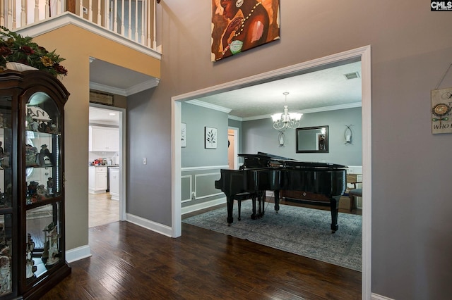 7 Chickasaw Cir, Columbia, SC 29229 - foyer entrance with ornamental molding, dark wood-style flooring, and a chandelier