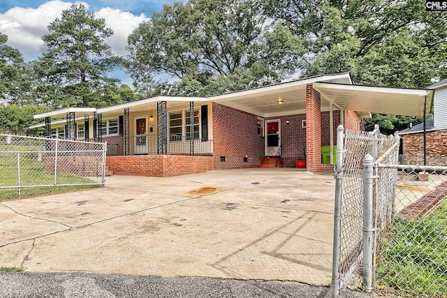 1700 Cermack St, Columbia, SC 29223 - view of front of home featuring crawl space, driveway, covered porch, a carport, and brick siding