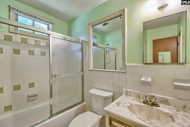 1700 Cermack St, Columbia, SC 29223 - full bath featuring vanity, enclosed tub / shower combo, and tile walls