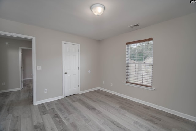 233 Eagle Pointe Dr, Chapin, SC 29036 - unfurnished bedroom with wood finished floors and baseboards