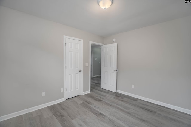 233 Eagle Pointe Dr, Chapin, SC 29036 - spare room featuring baseboards and wood finished floors