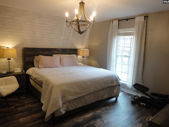 3909 E Peach Rd, Ridgeway, SC 29130 - bedroom with dark wood-type flooring and a chandelier