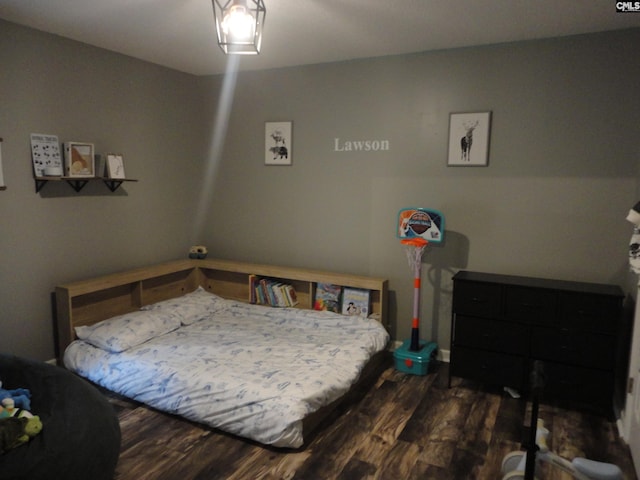 3909 E Peach Rd, Ridgeway, SC 29130 - bedroom featuring dark wood-type flooring