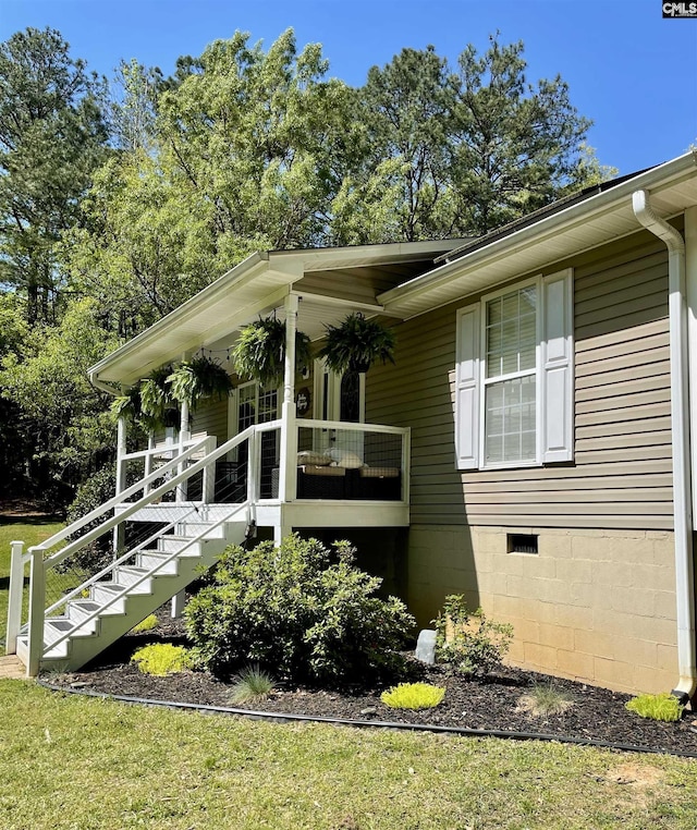 3909 E Peach Rd, Ridgeway, SC 29130 - view of side of home with stairs and a lawn