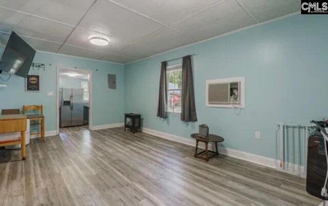 3909 E Peach Rd, Ridgeway, SC 29130 - living room with wood finished floors and a wall mounted AC