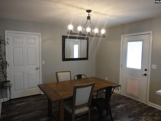 3909 E Peach Rd, Ridgeway, SC 29130 - dining area featuring dark wood-type flooring and a chandelier
