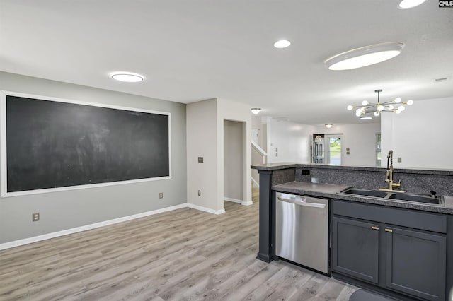 339 Bracken Dr, Lexington, SC 29072 - kitchen featuring stainless steel dishwasher, light wood-style floors, dark countertops, gray cabinetry, and a chandelier