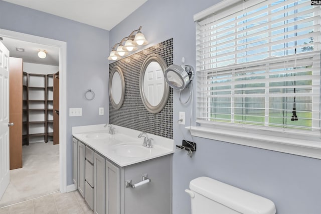 339 Bracken Dr, Lexington, SC 29072 - full bathroom with healthy amount of natural light, double vanity, and tile patterned flooring