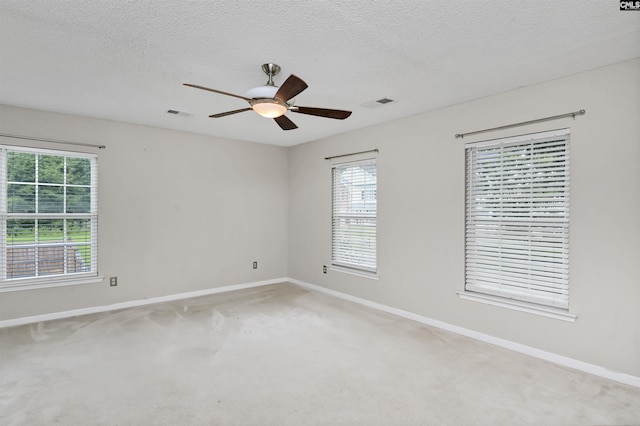 339 Bracken Dr, Lexington, SC 29072 - unfurnished room featuring plenty of natural light, ceiling fan, light carpet, and a textured ceiling