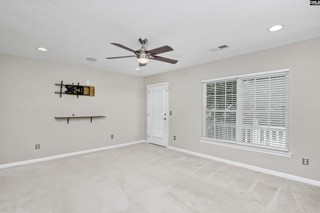 339 Bracken Dr, Lexington, SC 29072 - spare room with a ceiling fan, light colored carpet, recessed lighting, and a textured ceiling