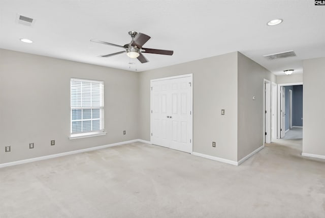339 Bracken Dr, Lexington, SC 29072 - unfurnished bedroom featuring light carpet, a closet, a ceiling fan, and recessed lighting