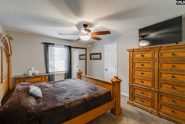 1162 Whippoorwill Rd, Camden, SC 29020 - bedroom with carpet flooring, a ceiling fan, and a textured ceiling