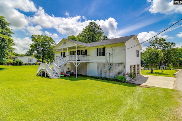 1162 Whippoorwill Rd, Camden, SC 29020 - rear view of property with stairway, a yard, a porch, and driveway