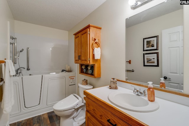 1162 Whippoorwill Rd, Camden, SC 29020 - full bathroom featuring a bath, wood finished floors, vanity, a textured ceiling, and a shower