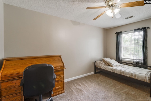 1162 Whippoorwill Rd, Camden, SC 29020 - bedroom featuring light carpet, a textured ceiling, and ceiling fan